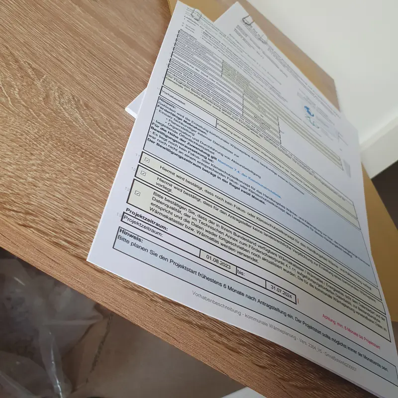 Förderantragsformulare auf einem Tisch